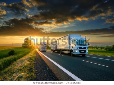 overtaking trucks on asphalt road 600w 761865583